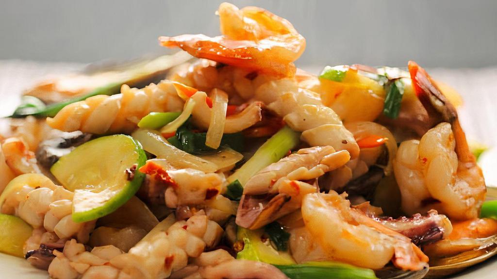 Seafood Bokkeum · Jumbo shrimp, scallops, mussels, calamari, octopus, zucchini, carrots, onions, scallions, mushrooms and jalapenos stir fried in a seafood garlic sauce and blended spices.