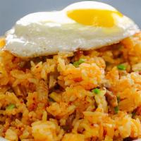 Kimchi Bokkeum Bap · Kimchi & pork fried rice topped with a fried egg.