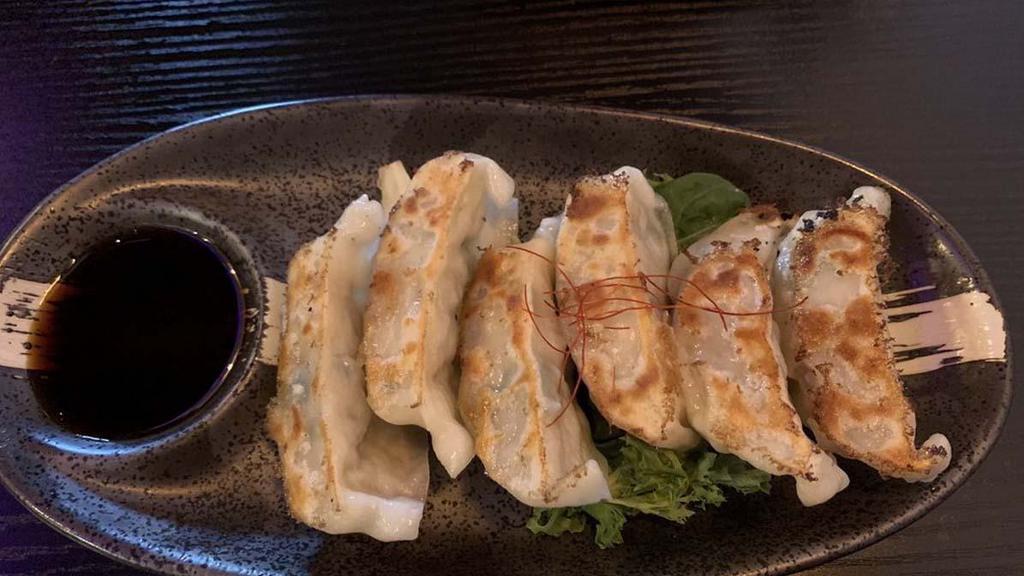 Gyoza (6) (Pork Or Vegetables) · Pan fried or steamed homemade dumpling served with chef special gyoza sauce.