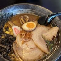 Kyushu Black Garlic Tonkotsu Ramen · Pork or chicken chashu, half of soft-boiled egg, fish cake, nori (seaweed sheet) wood ear mu...
