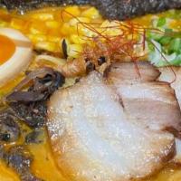 Spicy Miso Ramen · Hot & spicy.  Pork or chicken chashu, half of soft-boiled egg, sweet corn, cabbage, bean spr...