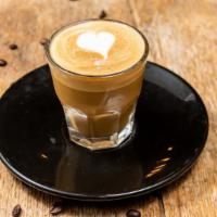 Cortado · Double shot of espresso combined with an equal part of steamed milk.