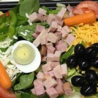 Chef Salad · Ham, turkey, and one egg on garden salad.