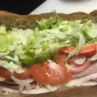 Grinder Sub · Our specialty, ham, salami, turkey, and beef.