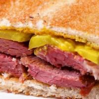 Corned Beef Sandwich · Our famous corned beef (6oz), served on your choice of bread with the toppings of your choice.