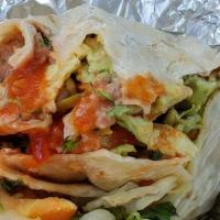 Veggie Burrito · Choice of beans, rice, potato, or Mexican potatoes. With lettuce tomato and cheese.