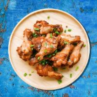 Traditional Chicken Wings · Bone-in chicken wings with a choice of your favorite wing style.