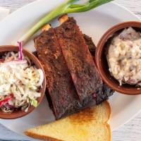 Rib Dinner · 5 Dry-rubbed & slow hickory smoked ribs and 2 sides