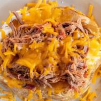 Super Loaded Potato · Loaded, topped with your choice of meat.