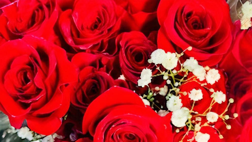 With All My Heart  · 24 Long stem Red Roses  hugged with baby's breathe  in a beautiful  vase. Free Box of Chocolates to add that special touch