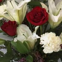 Radiant · How about an  Assortment of  White Lilies and Red  Roses  to show that special someone that ...