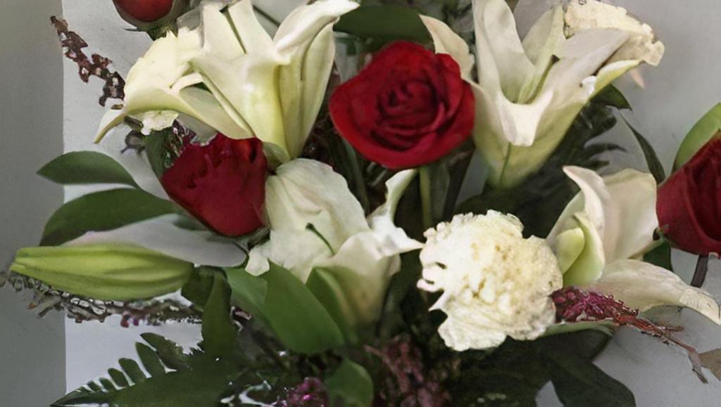 Radiant · How about an  Assortment of  White Lilies and Red  Roses  to show that special someone that you are thinking of them.
