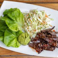 Steak Lettuce Wraps(Delivery) · Chili-spiced flank steak, sesame slaw and avocado puree. Served with lettuce cups