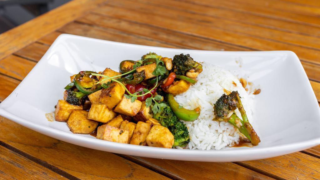 Kung Pao Tofu(Delivery) · Pan fried tofu in kung pao sauce with broccoli,. fresno chilies, peppers, crushed peanuts and. fresh cilantro. Served with jasmine rice
