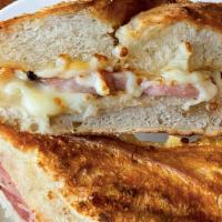 Psg Street Sammy · Parisian street sammy with smoked ham, Muenster cheese, creamy butter on a French baguette.