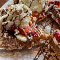 Golden Goal Waffle · Light, crispy, fluffy, golden goodness sweet waffle, dusted with powdered sugar. Add-ons: ba...