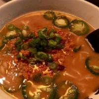 Spicy Miso Ramen · Our miso butter corn ramen, taken to the next level with a spicy paste crafted from chili pe...