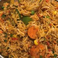 Vegetable Biryani · Vegetables in a lightly spiced sauce, with herbs, baked with basmati rice