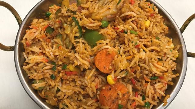 Vegetable Biryani · Vegetables in a lightly spiced sauce, with herbs, baked with basmati rice