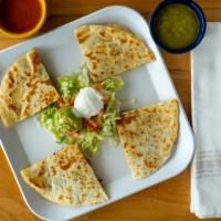 Quesadilla (1) · Chicken or beef, with guacamole, sour cream served with rice and beans.