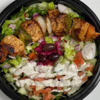 Chicken Shish Kebab Meal · Pieces of marinated chicken breast, tomato, onions, and green peppers on a kebab. Served wit...