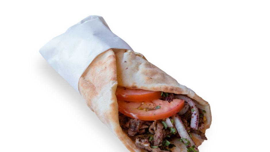 Beef Shish Kabob Sandwich · Tender and juicy cubes of ribeye skwered and grilled, rolled in lebanese bread or pita bread. comes with (tahini sauce, tomatoes, pickles and onion).