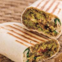 Falafel Sandwich · Grained chickpeas and vegetables lightly seasoned, garnished With sesame and deep fried, rol...