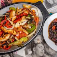 Fajitas Combo · 2 pieces. Green pepper, onions, and tortilla. Served with refried beans and Mexican rice, gu...