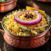 Mixed Vegetable Biryani · Dairy. Mixed vegetable in layers of fluffy rice, fragrant spices and caramelized onions.