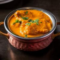 Chicken Curry · Boneless chicken cooked with onion, tomato and nepali spices.