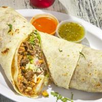 Veggie Burrito · Flour tortilla (10 inches) 
Rice, beans, grilled bell peppers, onion, tomatoes. shredded che...