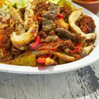 Fajita Tejana · A mixture of steak, chicken, chorizo, and bell peppers, served with rice and beans. lettuce,...