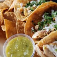 Tacos · 3 pulled chicken or pulled pork tacos with cilantro and onion. Comes with house made salsa a...
