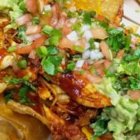 Bbq Nachos · Fresh cut tortilla chips, cheddar cheese, pico de gallo, guacamole, Windy City BBQ sauce. Ad...