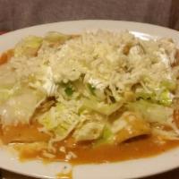Two Enchiladas  · Served with choice of rice or beans