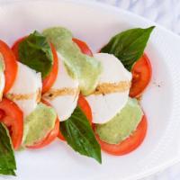 Caprese · Fresh mozzarella, sliced roma tomato & basil leaves drizzled with balsamic oil blend & toppe...
