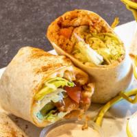 Cajun Ranch Chicken Wrap · Crispy chicken served in a warm flour tortilla with lettuce, tomato, bacon, our special chee...