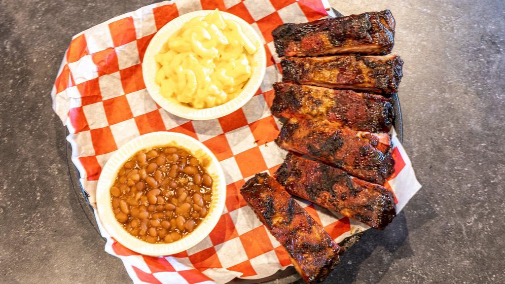 Bar-B-Que Ribs Platter · Judged Americas best ribs! Our first place award winning ribs are expertly seasoned with over 20 spices, then slowly smoked in our authentic bar-b-que smokers. Absolutely, positively the best ribs in the entire universe!