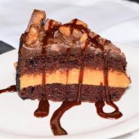 Peanut Butter Cup Cake · Chocolate Cake with a thick layer of Peanut Butter top with a generous portion of Peanut But...