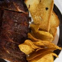 Half Rack Dinner · A Half Rack of Slow-Smoked Ribs topped with Original Barbecue Sauce, served with Two pieces ...