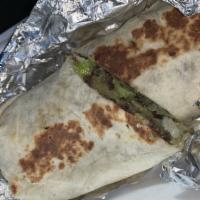 Falafel Sandwich · Chid peas med blended with purely, onions, cilantro and garlic the deep-fried and topped wit...