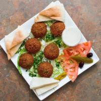 6 Pc. Falafel Patties · Seasoned chickpeas mixed with parsley, garlic and onions then deep fried. Served with tahini...