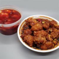 Dragon Meets Phoenix · General tools chicken with hot and spicy shrimp.