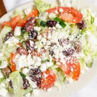 Greek Salad · Lettuce, tomatoes, kalamata olives, cucumbers, Feta.
