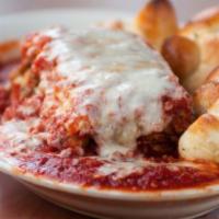 Meat Lasagna · Homemade meat lasagna layered with cheeses, topped with our authentic NY-style marinara and ...