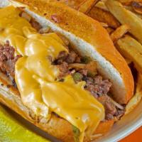 Philly Steak · grilled peppers, onions, and nacho cheese, served on a hoagie.