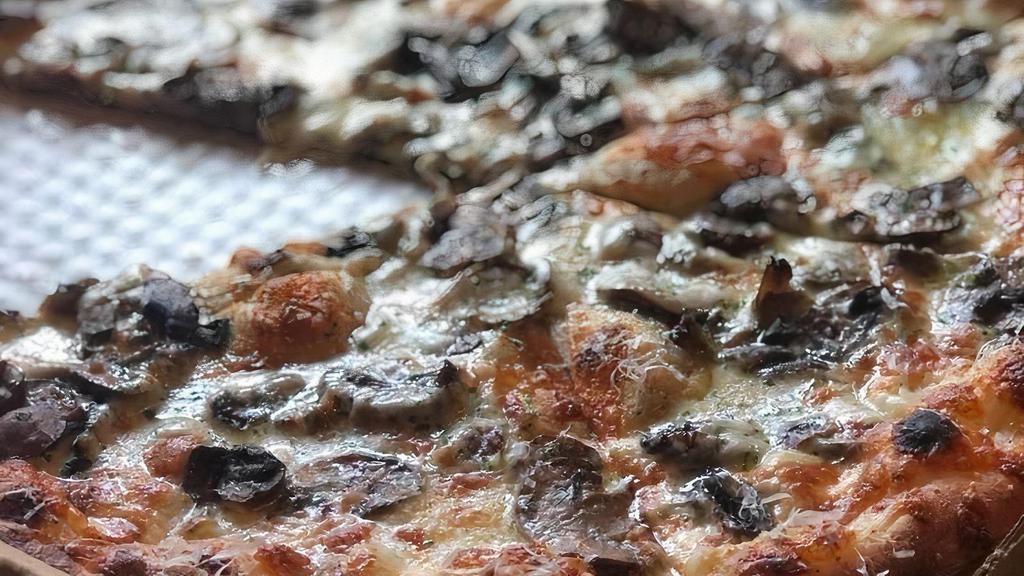 Jeffie Special Pizza · Beef, garlic, mushrooms, giardiniera, mozzarella and cheddar cheese, black olives, tomatoes and onions.