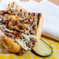 Philly Steak · With mozzarella & fried onions.