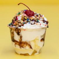 Ice Cream Sundae · 2 scoops of your choice of ice cream with whip cream, 2 toppings of your choice, syrup of yo...