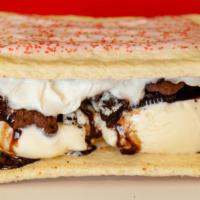 Pop Tart Ice Cream Sandwich · Two scoops of ice cream, with 2 toppings and whip cream and syrup sandwiched between 2 piece...